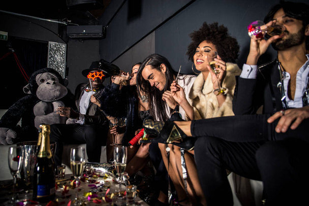 Friends having party in nightclub   - Фото, зображення