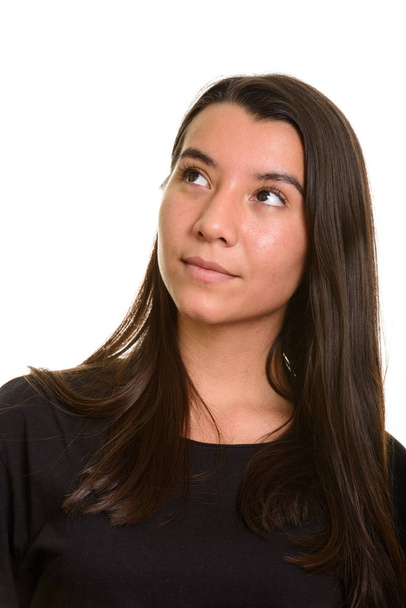 Young beautiful Caucasian woman thinking - Фото, изображение