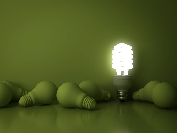 Энергосберегающая лампочка, одна светящаяся флуоресцентная лампочка, выделяющаяся из мертвых лампочек накаливания на зеленом фоне, индивидуальность и различные творческие идеи
 - Фото, изображение
