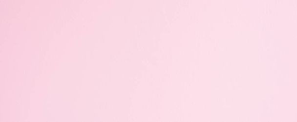 Pink paint cement wall texture can use for background or cover. Panoramic banner. - Foto, afbeelding