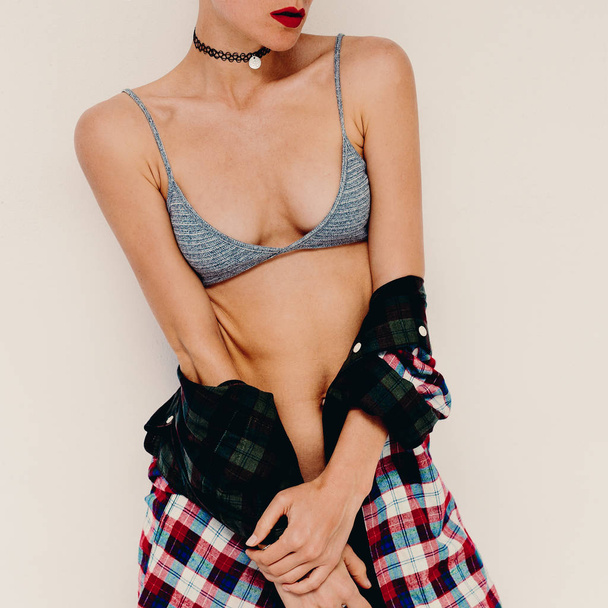 Casual fashion style Model. Bra and checkered shirt. Sensual acc - Φωτογραφία, εικόνα