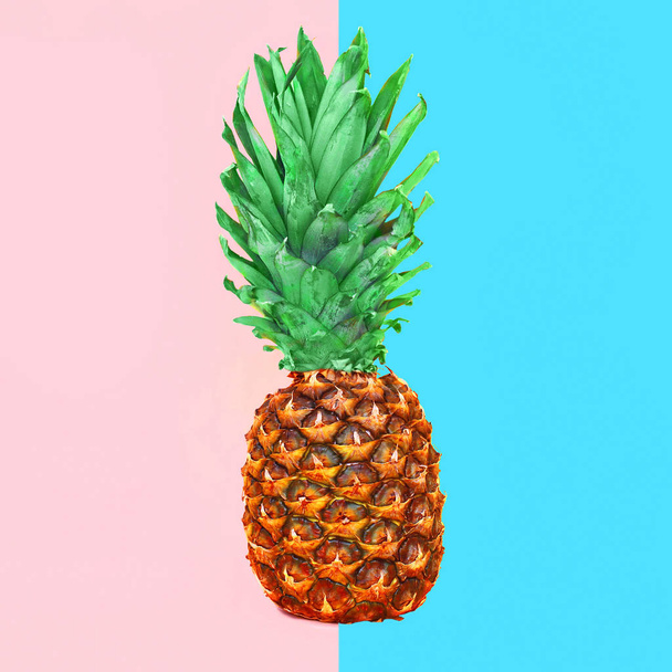 Pineapple fruit on colorful pink blue background, ananas photo - Fotó, kép