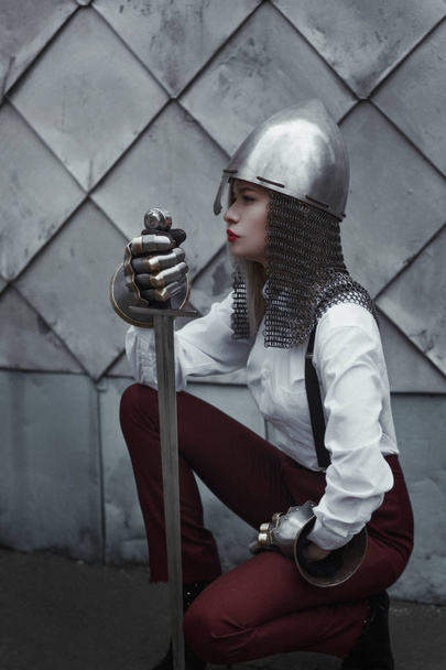 Girl with sword close-up - Фото, зображення