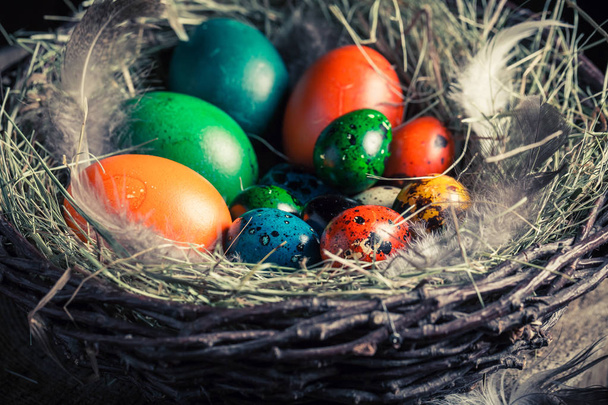 Various Easter eggs in the rustic cottage - Foto, imagen