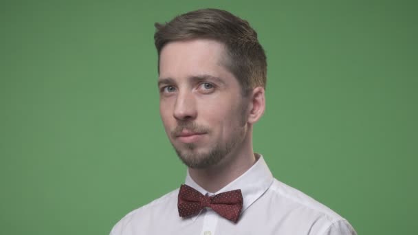man in a white shirt with a bow tie - Footage, Video