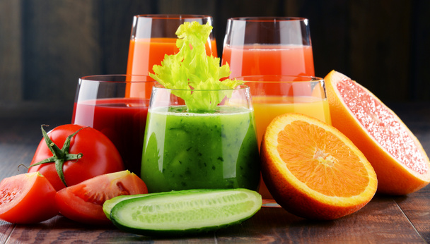 Glasses with fresh organic vegetable and fruit juices - Photo, Image