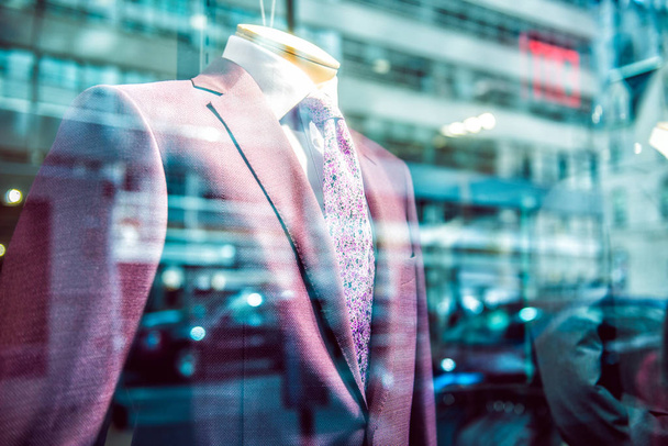 City business people lifestyle concept. Fast city life in window reflection from suit store on Wall street. - 写真・画像