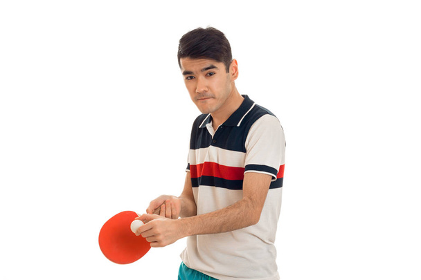 concentrated sportsman practicing ping-pong isolated on white background - Foto, afbeelding