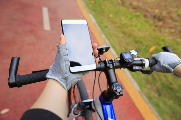 cyclist use smartphone for navigation  - Фото, зображення