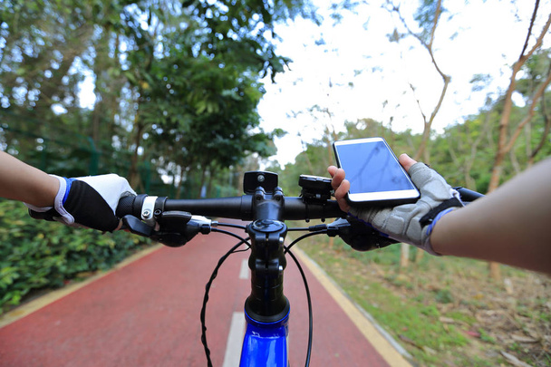 cyclist use smartphone for navigation  - Photo, image