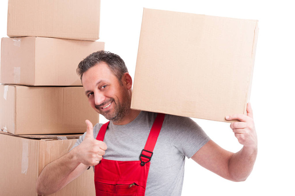 Mover man holding box and showing like gesture - Photo, Image