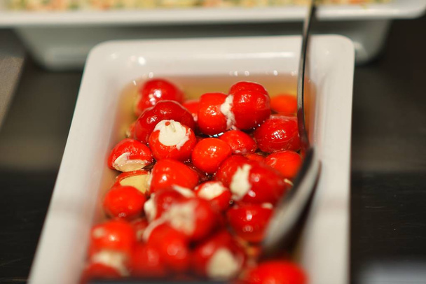 Cherry peppers stuffed with cheese - Valokuva, kuva