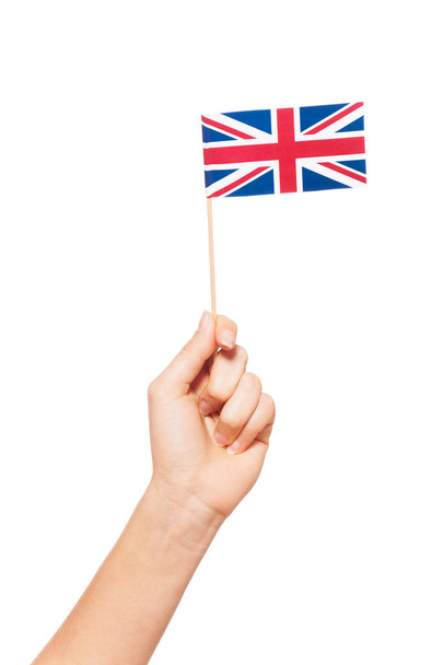 Hand holding flag of Great Britain - Foto, imagen
