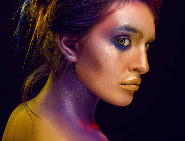 Creative art makeup. Close-up studio portrait of young fashion m - Фото, изображение