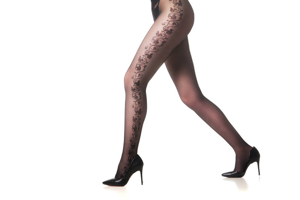 Female legs in tights cut out - Фото, зображення