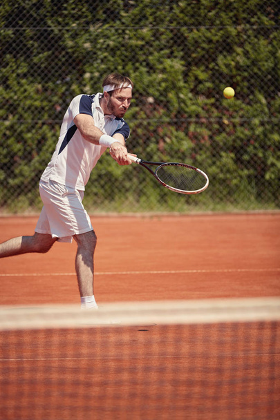 Tennis player serving ball   - Fotografie, Obrázek