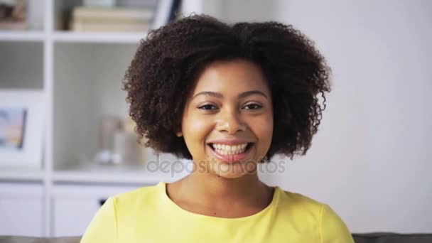 happy african american young woman face at home - Metraje, vídeo