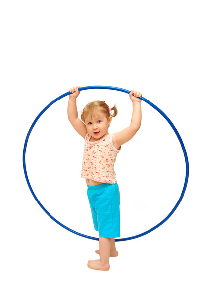 The little girl with a hoop - Фото, зображення