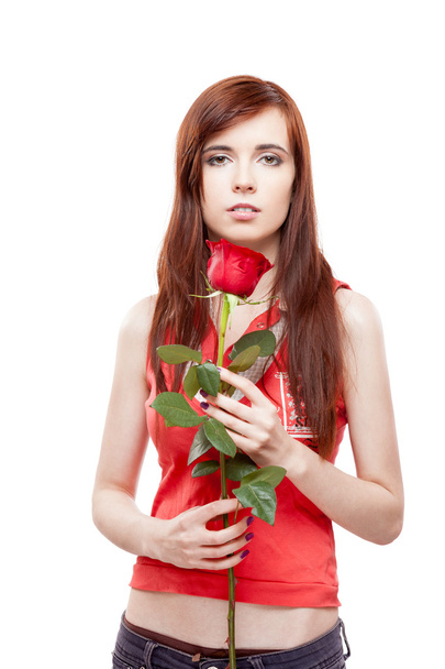 Girl holding red rose - Zdjęcie, obraz