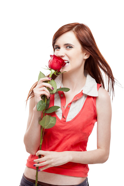 Girl holding red rose - Fotografie, Obrázek