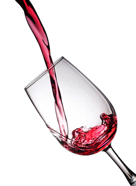Splash of a red wine in glass - Photo, image