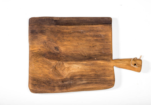 Old wooden kitchen board on a white background - Photo, Image