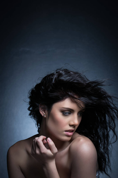 Beautiful brunette model in a studio  - Φωτογραφία, εικόνα