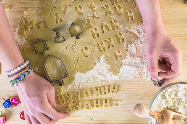  Making homemade Hanukkah cookies. - Фото, изображение