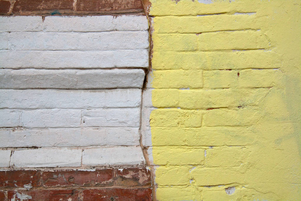 Colorful (yellow, white and brown) brick wall as background, texture - Φωτογραφία, εικόνα
