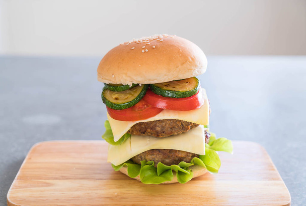 burger on wood plate  - American food - Φωτογραφία, εικόνα