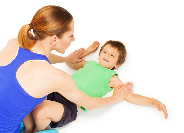 kid boy doing exercises with mother - Foto, Imagem