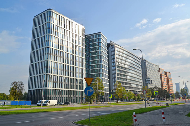 WARSAW, POLAND - AUGUST 23, 2014: Modern office buildings on the  street the Jerusalem avenues - Fotó, kép