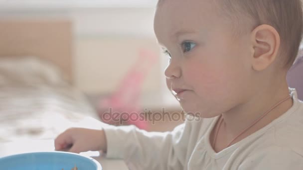 Child plays with food - Materiał filmowy, wideo