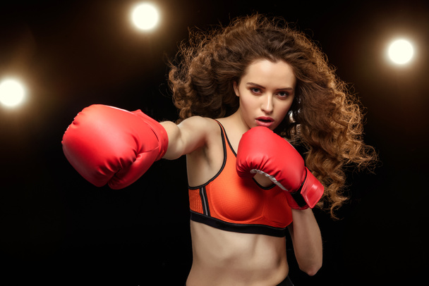 sportswoman boxer punching - Photo, Image