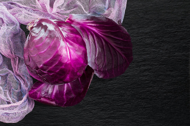Scotch kale or red cabbage on a slate board  - Photo, Image
