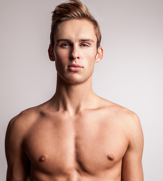 Attractive young undressed man model. - Foto, afbeelding