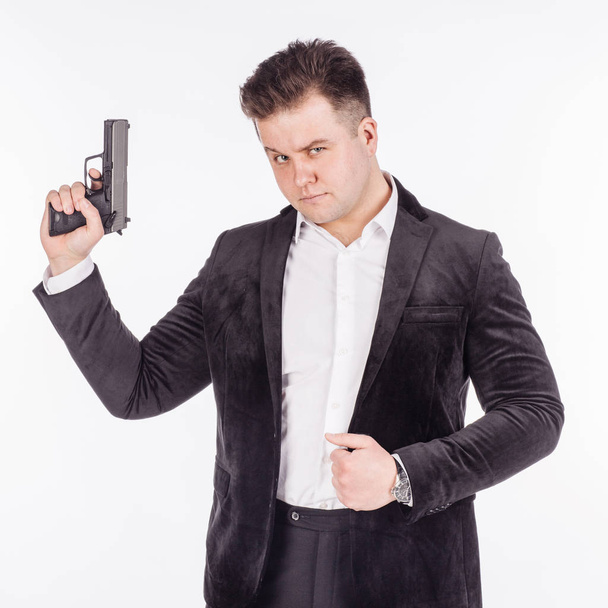 man with pistol. dangerous concept - Фото, изображение