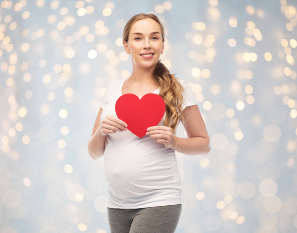 happy pregnant woman with red heart - Photo, image