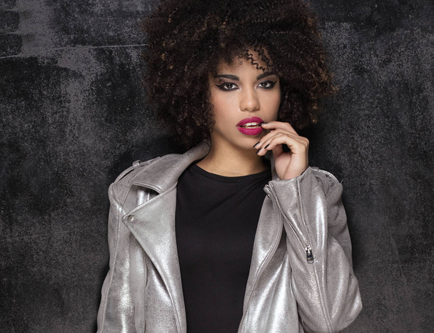Fashionable girl with afro hairstyle posing. - Photo, Image