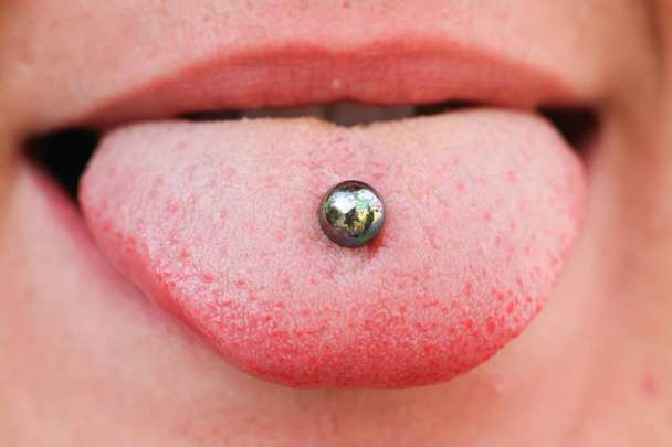 female mouth witht piercing - Photo, Image