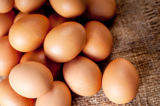  Eggs on wooden  background - Foto, Bild