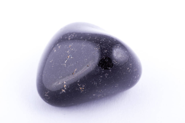 Macro mineral stone black onyx against white background - Photo, Image