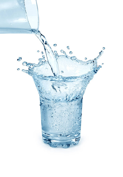 Splash of water in a glass on a white background - Photo, Image