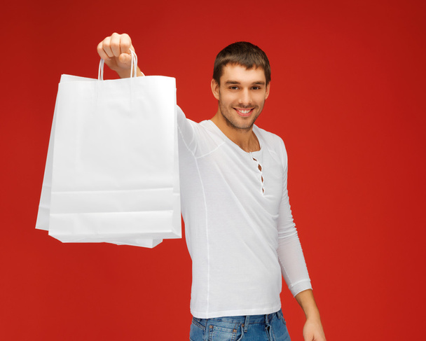 Man with shopping bags - Photo, image