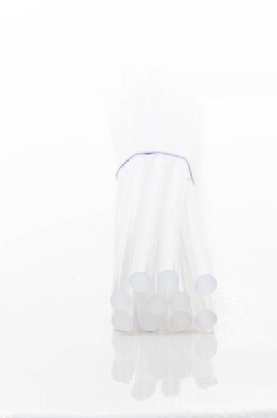 Hot glue sticks on white background - Фото, зображення