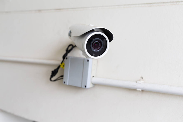 Câmera de vigilância na parede
 - Foto, Imagem
