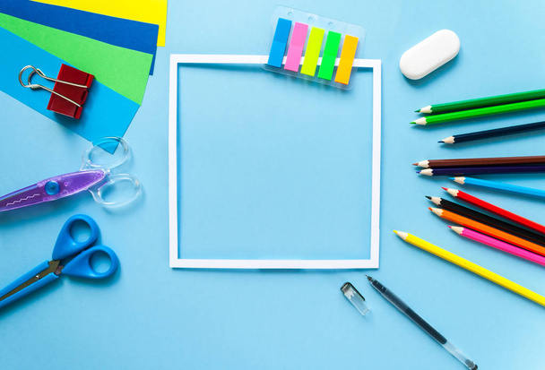 square frame with stationery flat lay on black chalkboard - 写真・画像