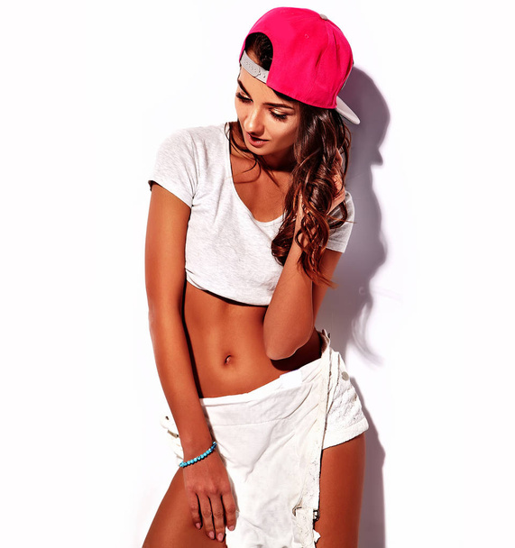 model in rnb style clothes with pink colorful baseball cap - Foto, imagen