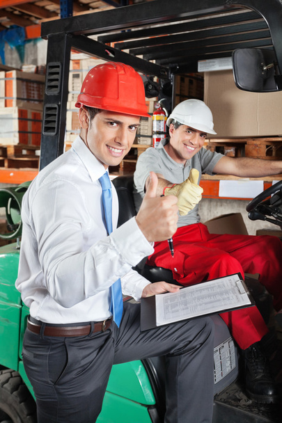 Supervisor And Forklift Driver Gesturing Thumbs Up - Photo, Image