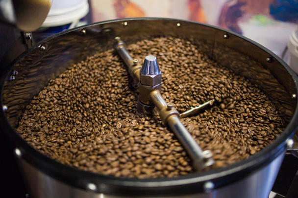Freshly roasted coffee beans  - Фото, зображення
